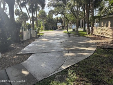 Enjoy resort-style living on this beautifully shaded RV lot with on The Great Outdoors Golf and Country Club in Florida - for sale on GolfHomes.com, golf home, golf lot