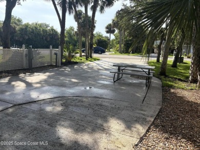 Enjoy resort-style living on this beautifully shaded RV lot with on The Great Outdoors Golf and Country Club in Florida - for sale on GolfHomes.com, golf home, golf lot