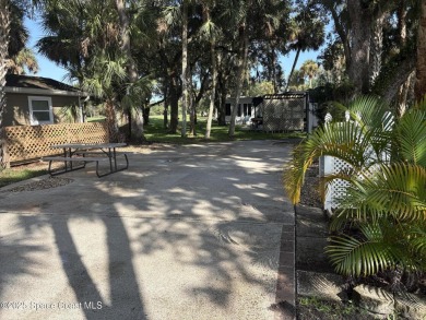 Enjoy resort-style living on this beautifully shaded RV lot with on The Great Outdoors Golf and Country Club in Florida - for sale on GolfHomes.com, golf home, golf lot