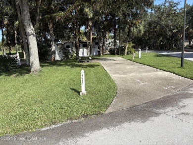 Enjoy resort-style living on this beautiful corner RV lot with on The Great Outdoors Golf and Country Club in Florida - for sale on GolfHomes.com, golf home, golf lot