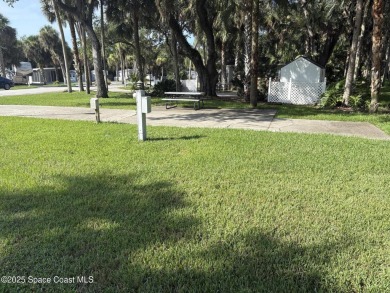 Enjoy resort-style living on this beautiful corner RV lot with on The Great Outdoors Golf and Country Club in Florida - for sale on GolfHomes.com, golf home, golf lot
