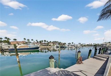 Set on a rare double lot in the prestigious, gated enclave of on Sailfish Point Golf Club, Inc. in Florida - for sale on GolfHomes.com, golf home, golf lot