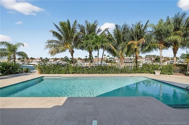 Set on a rare double lot in the prestigious, gated enclave of on Sailfish Point Golf Club, Inc. in Florida - for sale on GolfHomes.com, golf home, golf lot