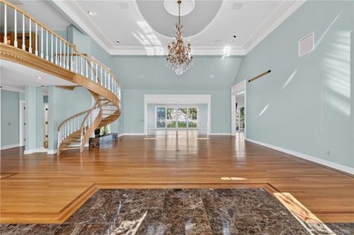 Set on a rare double lot in the prestigious, gated enclave of on Sailfish Point Golf Club, Inc. in Florida - for sale on GolfHomes.com, golf home, golf lot