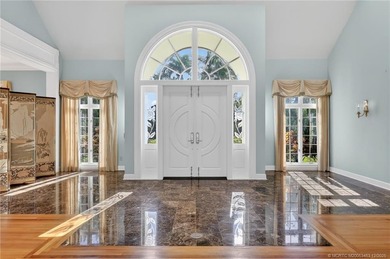 Set on a rare double lot in the prestigious, gated enclave of on Sailfish Point Golf Club, Inc. in Florida - for sale on GolfHomes.com, golf home, golf lot