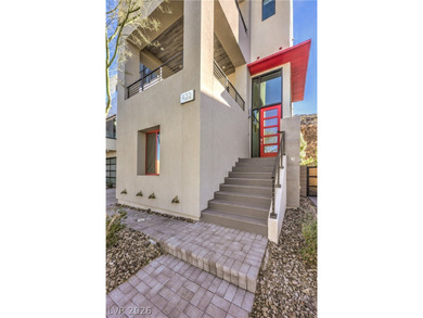 Experience elevated living in this 4-story modern architectural on Dragon Ridge Country Club in Nevada - for sale on GolfHomes.com, golf home, golf lot
