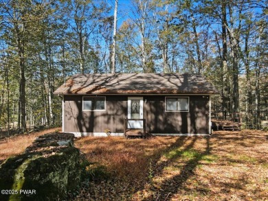 Dreaming of a Pocono escape without the hefty price tag? This on The Hideout Golf in Pennsylvania - for sale on GolfHomes.com, golf home, golf lot