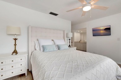 Captivating lakefront and golf views await in this spacious on Boca West Golf and Country Club in Florida - for sale on GolfHomes.com, golf home, golf lot