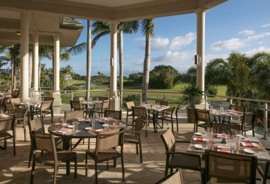 Captivating lakefront and golf views await in this spacious on Boca West Golf and Country Club in Florida - for sale on GolfHomes.com, golf home, golf lot