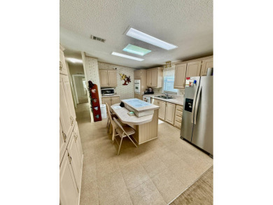 Welcome to Marina Cove at Highlands Ridge, a quiet and friendly on Highlands Ridge Golf Course - South in Florida - for sale on GolfHomes.com, golf home, golf lot
