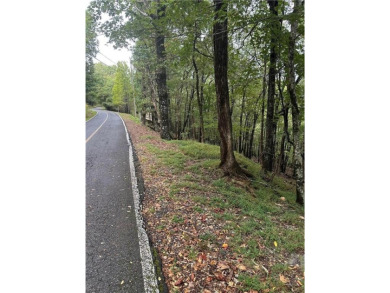 This .96 acre lot slopes gently down and should have a good view on Bent Tree Golf Course in Georgia - for sale on GolfHomes.com, golf home, golf lot
