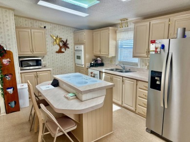 Welcome to Marina Cove at Highlands Ridge, a quiet and friendly on Highlands Ridge Golf Course - South in Florida - for sale on GolfHomes.com, golf home, golf lot