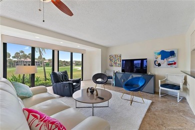 Enjoy relaxing in this villa taking in the peaceful golf course on Ocean Club At the Hutchinson Island Beach Resort in Florida - for sale on GolfHomes.com, golf home, golf lot