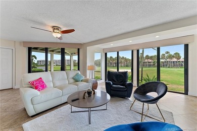Enjoy relaxing in this villa taking in the peaceful golf course on Ocean Club At the Hutchinson Island Beach Resort in Florida - for sale on GolfHomes.com, golf home, golf lot