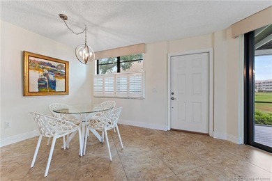 Enjoy relaxing in this villa taking in the peaceful golf course on Ocean Club At the Hutchinson Island Beach Resort in Florida - for sale on GolfHomes.com, golf home, golf lot