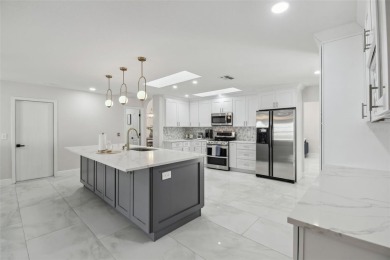 This simply amazing home has been completely remodeled with on Spring Hill Golf Course in Florida - for sale on GolfHomes.com, golf home, golf lot