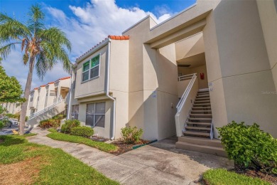 This beautiful, fully renovated and furnished condo offers a on Isla Del Sol Yacht and Country Club in Florida - for sale on GolfHomes.com, golf home, golf lot