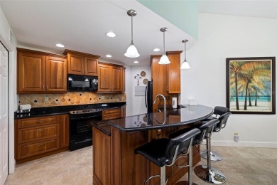 This beautiful, fully renovated and furnished condo offers a on Isla Del Sol Yacht and Country Club in Florida - for sale on GolfHomes.com, golf home, golf lot
