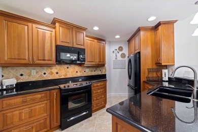 This beautiful, fully renovated and furnished condo offers a on Isla Del Sol Yacht and Country Club in Florida - for sale on GolfHomes.com, golf home, golf lot