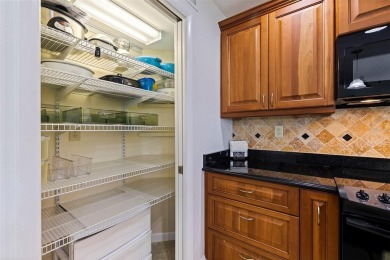 This beautiful, fully renovated and furnished condo offers a on Isla Del Sol Yacht and Country Club in Florida - for sale on GolfHomes.com, golf home, golf lot