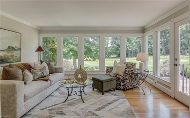 Classic white brick beauty nestled on the 16th fairway of Forest on Forest Oaks Country Club in North Carolina - for sale on GolfHomes.com, golf home, golf lot
