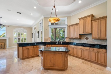 This custom designed 4 bed / 4 bath / 3 car garage home is on Bayou Golf Club in Florida - for sale on GolfHomes.com, golf home, golf lot