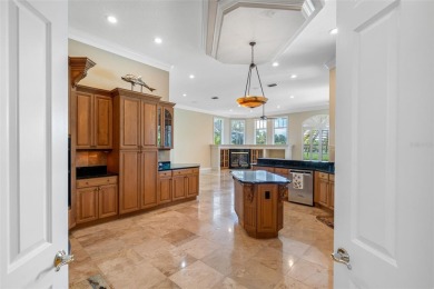 This custom designed 4 bed / 4 bath / 3 car garage home is on Bayou Golf Club in Florida - for sale on GolfHomes.com, golf home, golf lot