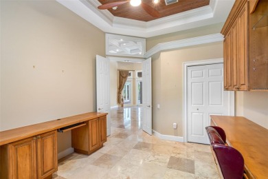 This custom designed 4 bed / 4 bath / 3 car garage home is on Bayou Golf Club in Florida - for sale on GolfHomes.com, golf home, golf lot