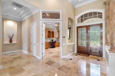 This custom designed 4 bed / 4 bath / 3 car garage home is on Bayou Golf Club in Florida - for sale on GolfHomes.com, golf home, golf lot