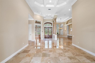 This custom designed 4 bed / 4 bath / 3 car garage home is on Bayou Golf Club in Florida - for sale on GolfHomes.com, golf home, golf lot