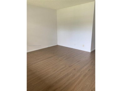 Beautiful remodeled condo in Century Village a Senior Community on Flamingo Lakes Country Club in Florida - for sale on GolfHomes.com, golf home, golf lot