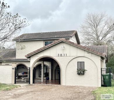 Live the good life in Rancho Viejo, Texas! This 4-bed, 4-bath on Rancho Viejo Resort and Country Club in Texas - for sale on GolfHomes.com, golf home, golf lot