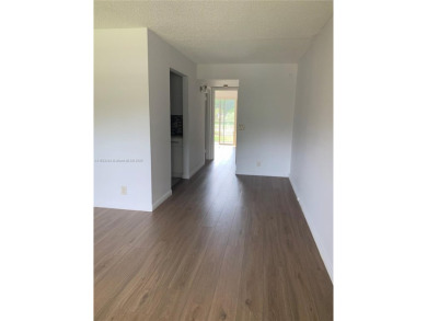Beautiful remodeled condo in Century Village a Senior Community on Flamingo Lakes Country Club in Florida - for sale on GolfHomes.com, golf home, golf lot