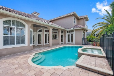 This custom designed 4 bed / 4 bath / 3 car garage home is on Bayou Golf Club in Florida - for sale on GolfHomes.com, golf home, golf lot