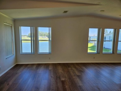 Some pictures have been virtually staged. This home is on leased on Big Cypress Golf and Country Club in Florida - for sale on GolfHomes.com, golf home, golf lot