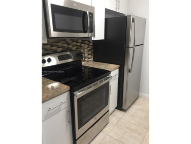 Beautiful remodeled condo in Century Village a Senior Community on Flamingo Lakes Country Club in Florida - for sale on GolfHomes.com, golf home, golf lot