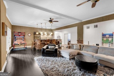 Welcome home to this stunning blend of luxurious living & on Laurel Springs Golf Club in Georgia - for sale on GolfHomes.com, golf home, golf lot