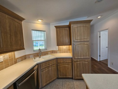 Some pictures have been virtually staged. This home is on leased on Big Cypress Golf and Country Club in Florida - for sale on GolfHomes.com, golf home, golf lot