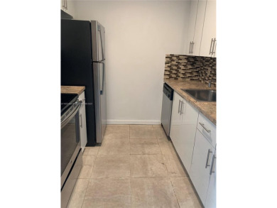 Beautiful remodeled condo in Century Village a Senior Community on Flamingo Lakes Country Club in Florida - for sale on GolfHomes.com, golf home, golf lot
