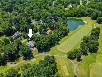 Classic white brick beauty nestled on the 16th fairway of Forest on Forest Oaks Country Club in North Carolina - for sale on GolfHomes.com, golf home, golf lot
