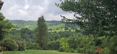 Build your dream home or invest in this scenic 0.5-acre lot in on Woodlake Golf Club in Tennessee - for sale on GolfHomes.com, golf home, golf lot