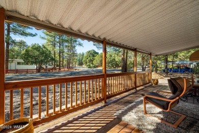 Nestled in Show Low's charming Fairway Park, this inviting on Bison Golf and Country Club in Arizona - for sale on GolfHomes.com, golf home, golf lot