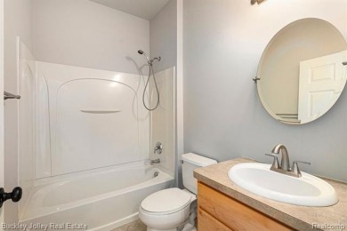 Stunning ranch condo in the Villas of Oceola.  Immediate on Chemung Hills Golf Club in Michigan - for sale on GolfHomes.com, golf home, golf lot