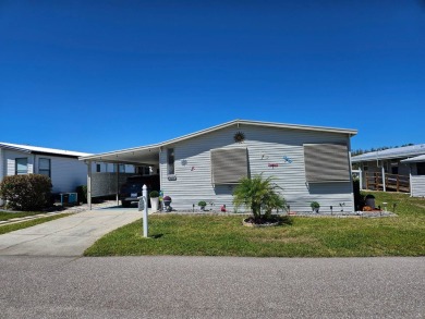 This home is in a 55+ resort-style manufactured home community on Big Cypress Golf and Country Club in Florida - for sale on GolfHomes.com, golf home, golf lot