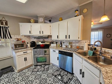 This home is in a 55+ resort-style manufactured home community on Big Cypress Golf and Country Club in Florida - for sale on GolfHomes.com, golf home, golf lot