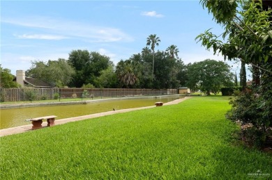 Experience serene pond-side living in this expertly crafted home on Harlingen Country Club in Texas - for sale on GolfHomes.com, golf home, golf lot