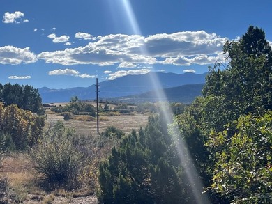 Discover your slice of Colorado paradise on this 1+ acre lot in on Hollydot Golf Course in Colorado - for sale on GolfHomes.com, golf home, golf lot