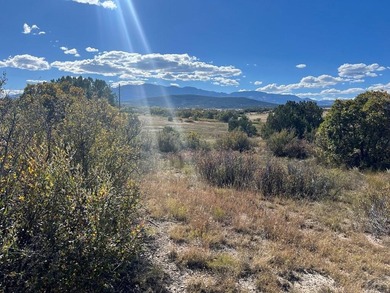 Discover your slice of Colorado paradise on this 1+ acre lot in on Hollydot Golf Course in Colorado - for sale on GolfHomes.com, golf home, golf lot