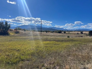 Discover your slice of Colorado paradise on this 1+ acre lot in on Hollydot Golf Course in Colorado - for sale on GolfHomes.com, golf home, golf lot