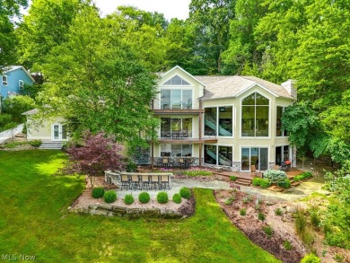 Welcome to your dream lakefront retreat! This stunning 6-bedroom on Lake Mohawk Golf Club in Ohio - for sale on GolfHomes.com, golf home, golf lot